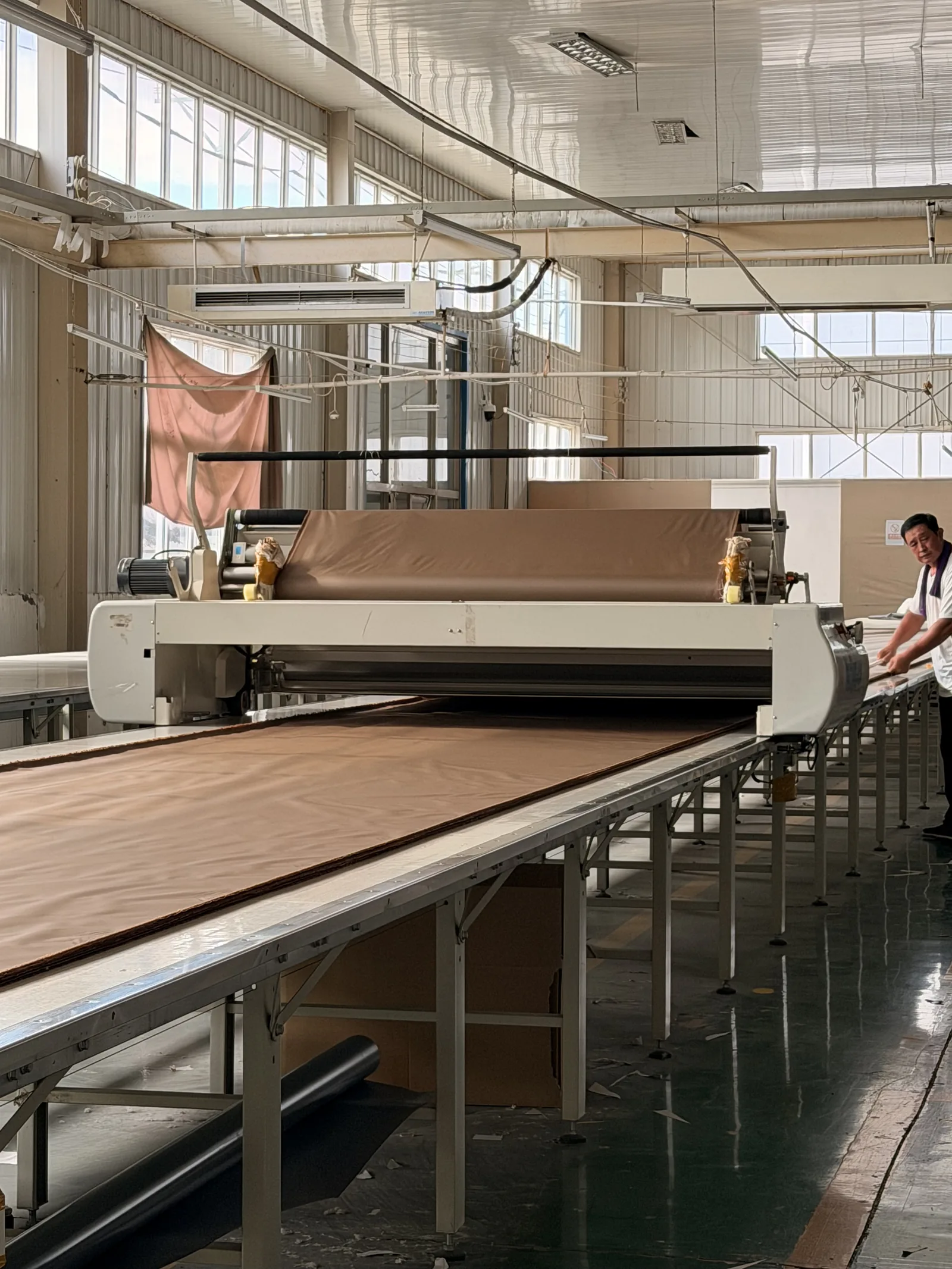 Tent fabric spreading and cutting equipment