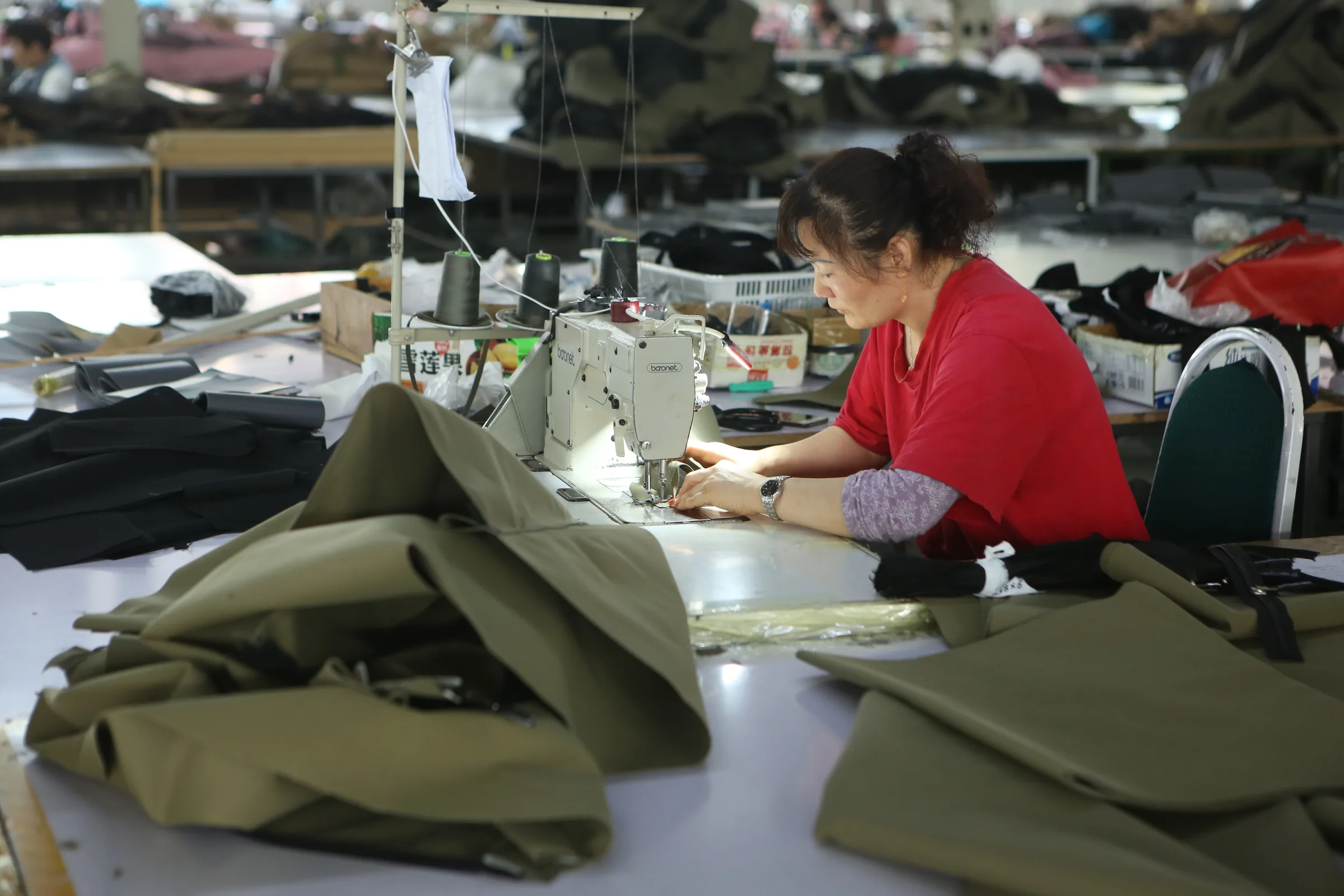 Detailed stitching of olive tent fabric